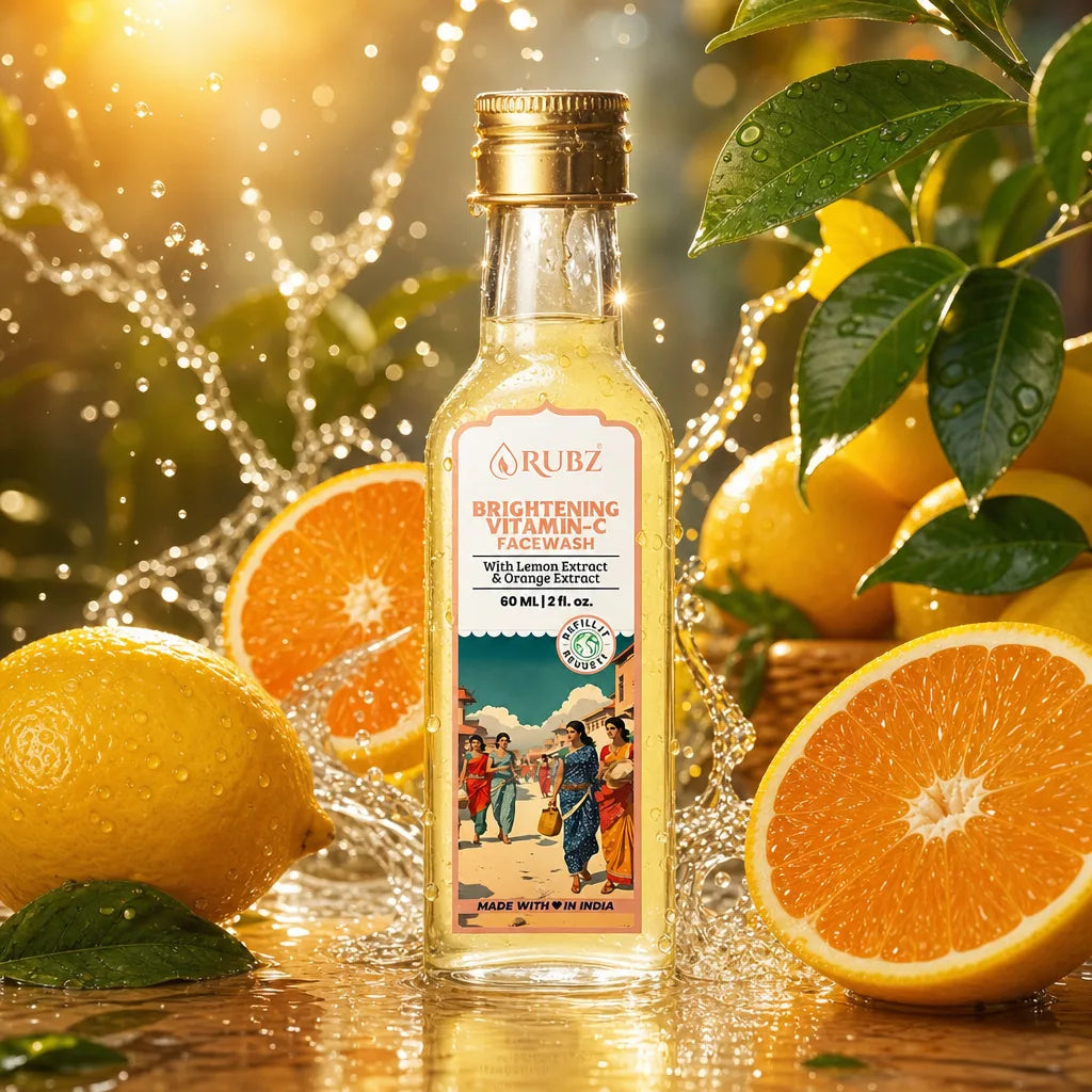Bottle of Rubz Brightening Vitamin C face wash with lemons and oranges in the background