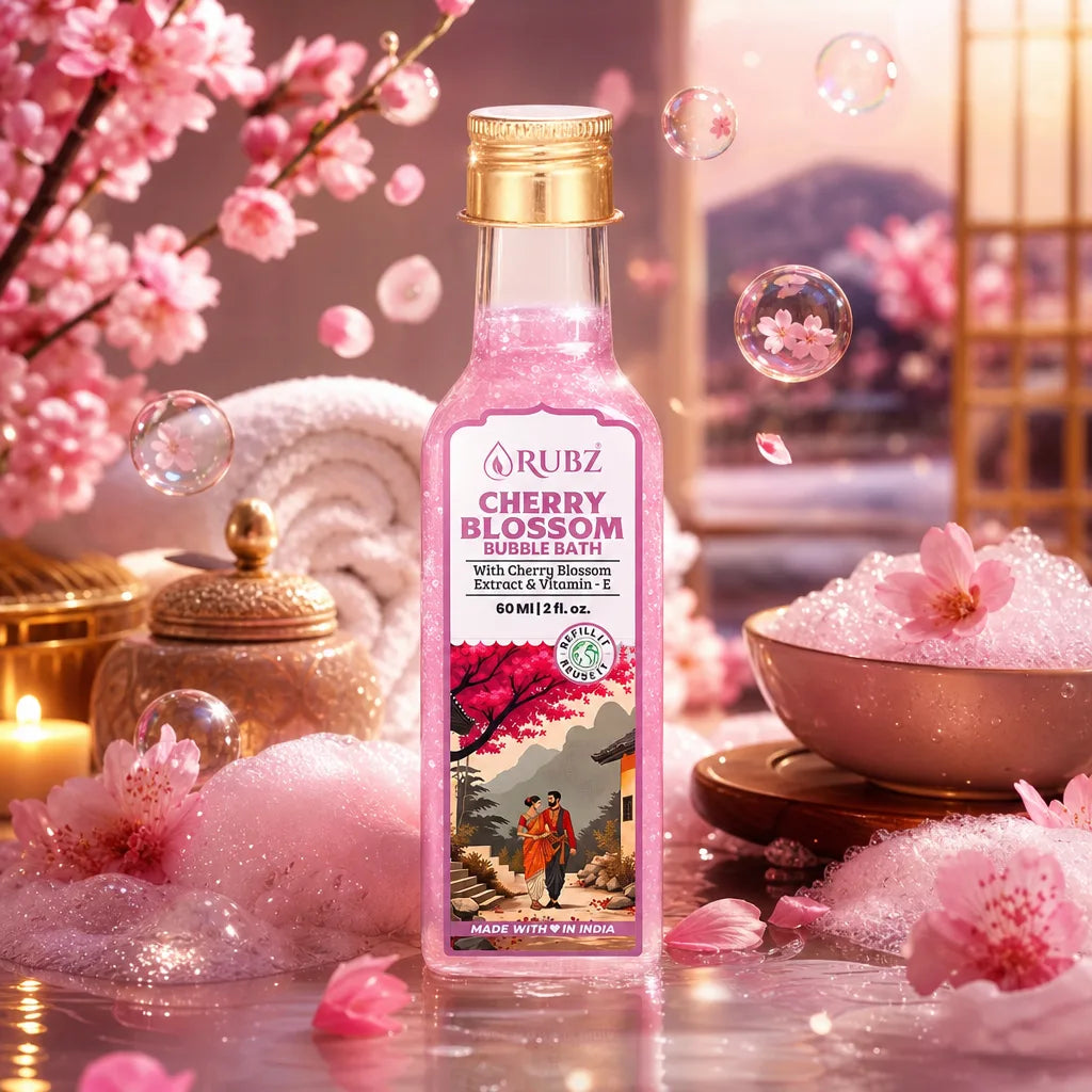 Bottle of Rubz Cherry Blossom bubble bath with cherry blossoms and bubbles in the background