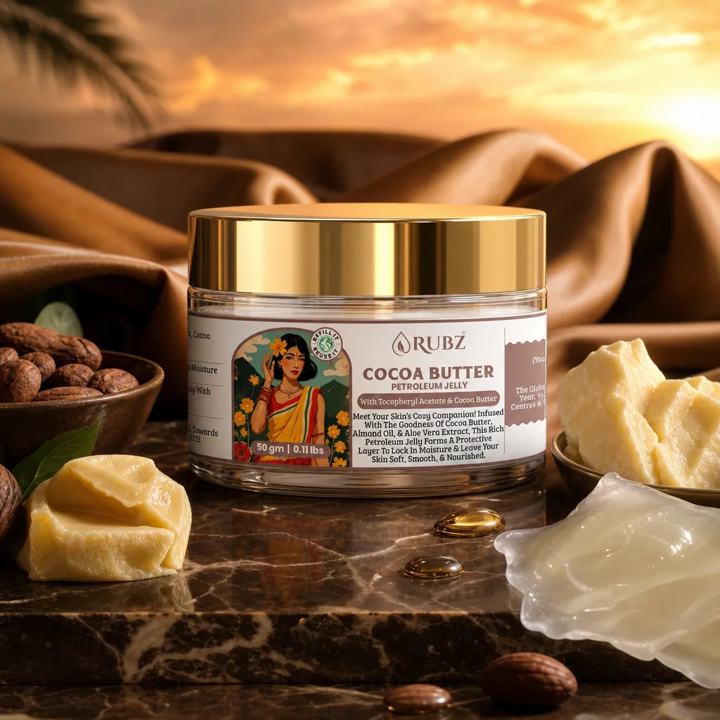 Jar of Rubz Cocoa Butter Petroleum Jelly with ingredients on a marble surface