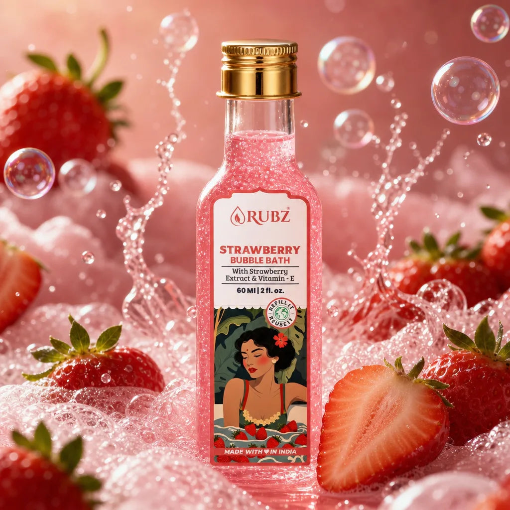 Bottle of Rubz Strawberry Bubble Bath surrounded by strawberries and bubbles on a pink background